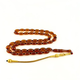 كهرمان طبيعي لون عسلي طربزون فضة مذهب