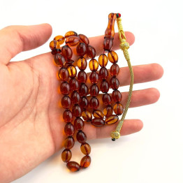 كهرمان طبيعي لون عسلي طربزون فضة مذهب