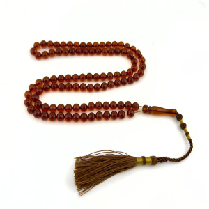 كهرمان طبيعي شفاف لون عسلي كركوشة بغدادية